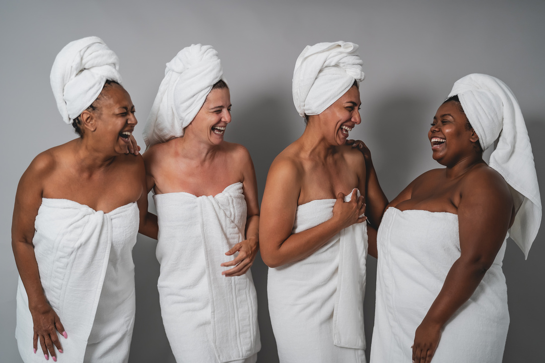 Women Wearing Wrapped White Towels 